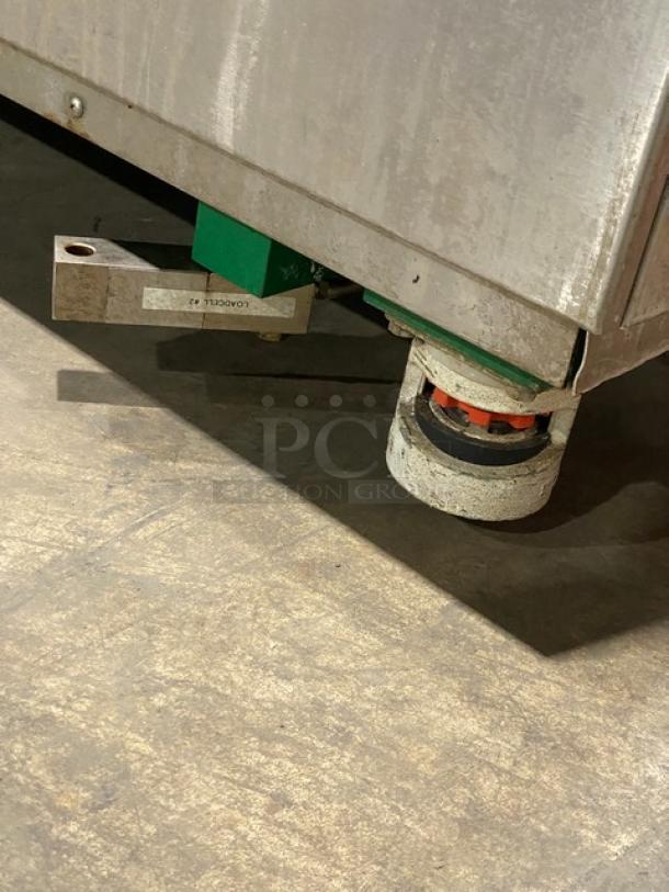 ORCA stainless steel electric food waste digester on casters, features on-board scale and touchscreen, 120V, closeup view.