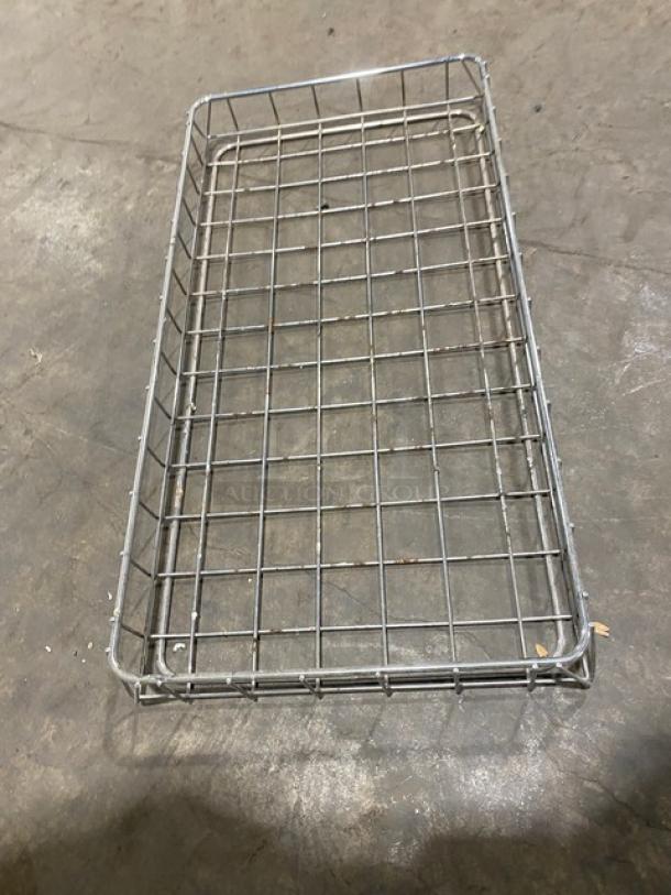 Commercial chrome-plated full-size bagel/pastry wire rack in used condition. Durable design for bakery display or storage.