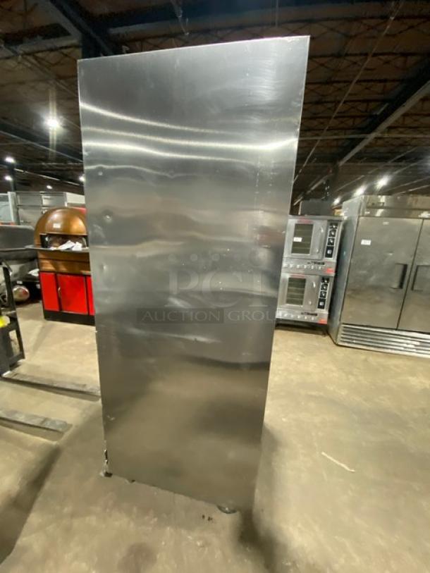 Traulsen stainless steel single door reach-in refrigerator, model RET132EUTFHS, on casters, with adjustable shelving.