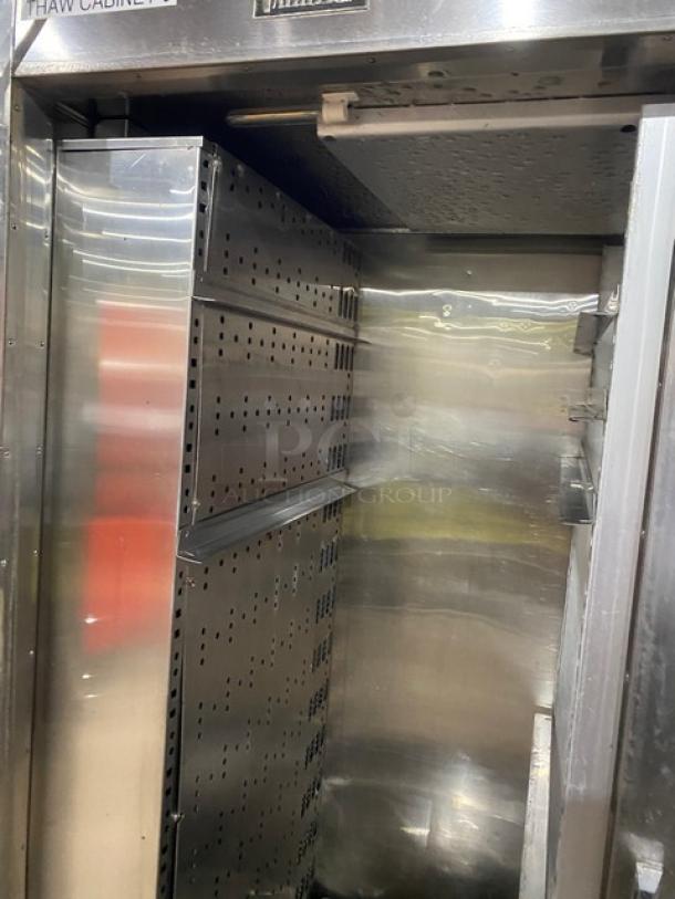 Traulsen RET132EUT-FHS stainless steel refrigerator interior, adjustable shelving, solid single door, on casters, 115V.