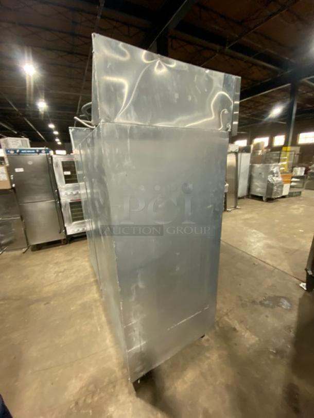 Continental 3F stainless steel 3-door reach-in freezer on casters. Energy Star certified, poly coated wired rack, serial 15366202.