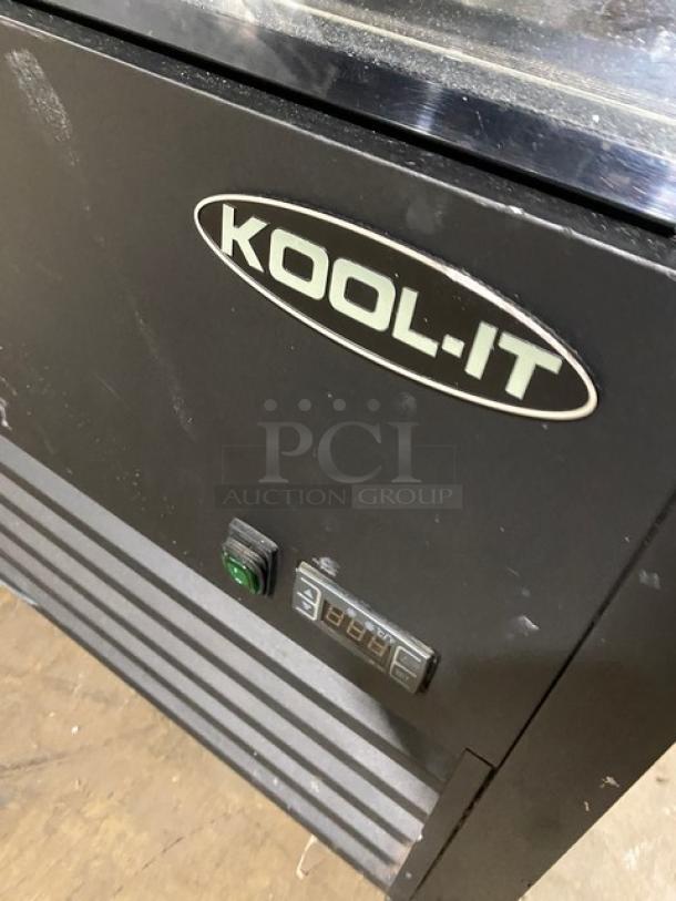 Kool-It Commercial Merchandiser Display Case, Model KOM36XBK, black finish, visible control panel, adjustable shelving.