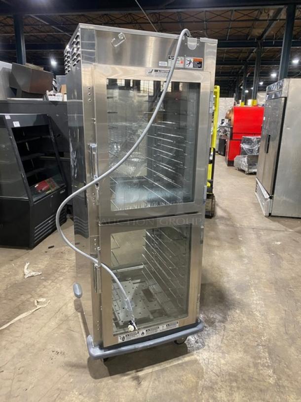 Metro stainless steel glass half door insulated mobile heated cabinet, model C599SDCUPDC, with built-in pan rack and casters.