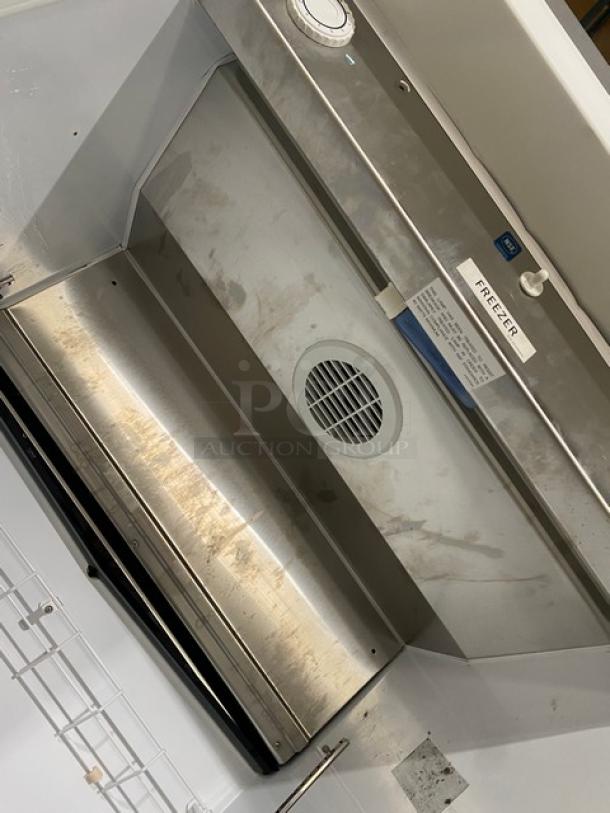 Kelvinator Commercial Stainless Steel Freezer, Model KFS220RHY1, Energy Star Certified, with poly coated rack, on casters.