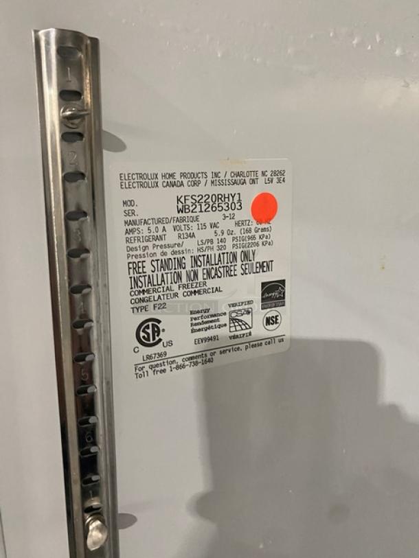 Kelvinator commercial stainless steel freezer, model KFS220RHY1, Energy Star certified, on casters, with poly coated rack.