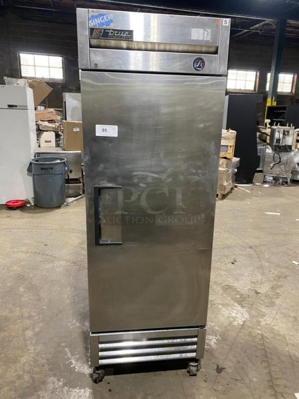 True T-19FZ commercial stainless steel single door reach-in freezer, poly coated wired rack, SN: 5242998, on casters.
