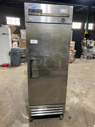 True T-19FZ commercial stainless steel single door reach-in freezer, poly coated wired rack, SN: 5242998, on casters.