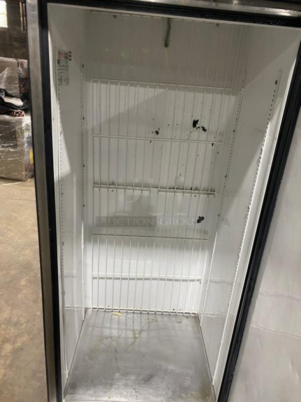True T-19FZ commercial stainless steel single door reach-in freezer with poly coated wired rack, on casters. 115V 1 phase.