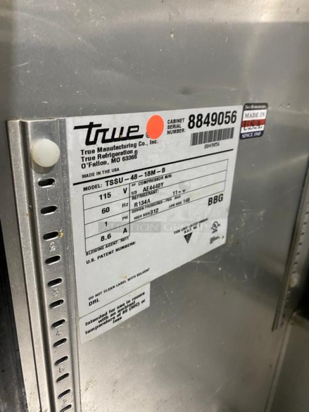 True TSSU-48-18M-B Refrigerated Prep Table label showing product details, model, and serial number 8849056. Made in USA.