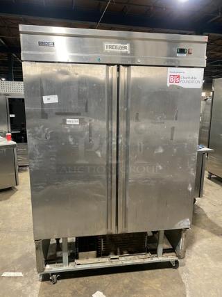 Economy EF2 commercial stainless steel 2-door reach-in freezer on casters. Energy Star certified, poly coated wired rack.