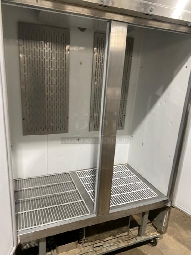 Economy EF2 stainless steel 2-door reach-in freezer, Energy Star certified, poly-coated wired rack, on casters, 115V.