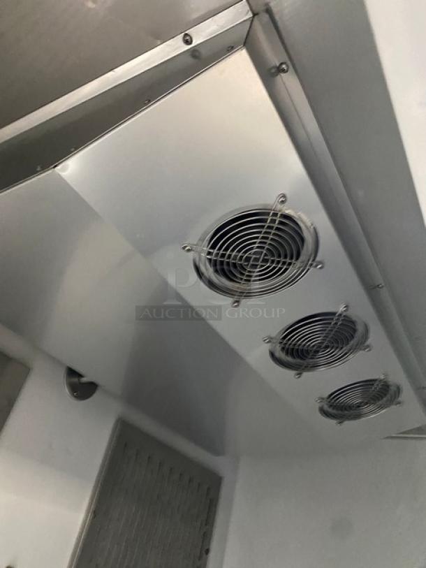 Economy EF2 stainless steel 2-door freezer, Energy Star certified, features poly coated racks, serial 6415170413120204.