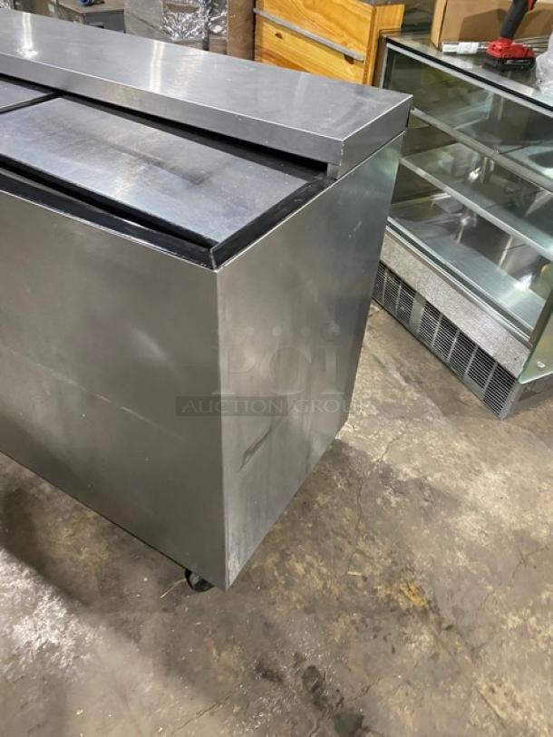 Perlick FR48SS stainless steel double section back bar cooler with sliding lids, chrome rack, 115V, on casters.