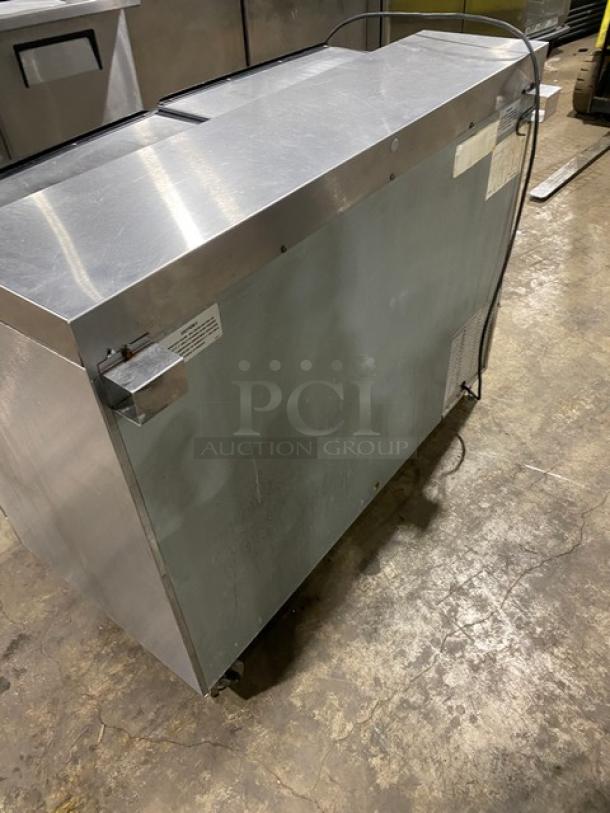 Perlick FR48SS stainless steel back bar bottle cooler, double sliding lids, chrome rack, on casters, 115V 1 Phase.