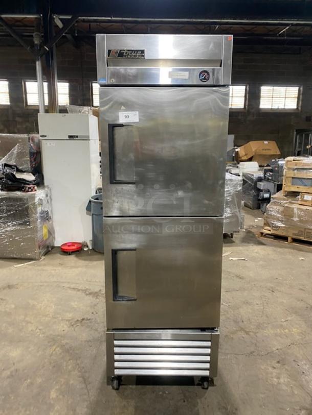 True Commercial Stainless Steel Single Section Reach-In Freezer, Model T-23F-2, with poly coated wired rack, on casters.