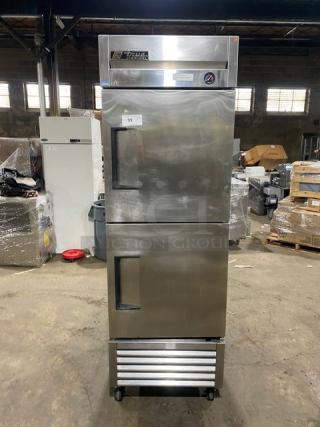 True Commercial Stainless Steel Single Section Reach-In Freezer, Model T-23F-2, with poly coated wired rack, on casters.