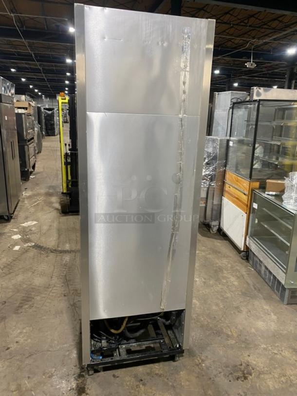 True T-23F-2 stainless steel single section freezer, half door, poly coated racks, model SN: 6820480, on casters.