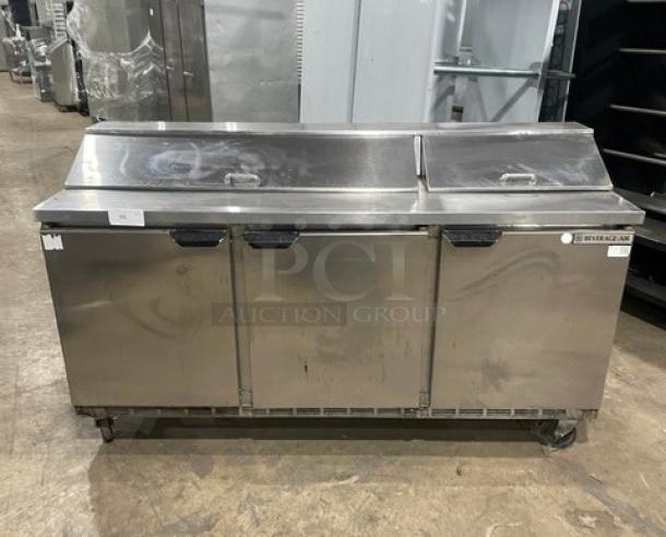Beverage-Air Elite Series stainless steel 3-door refrigerated salad/sandwich prep table, model SPE72-18, on casters.