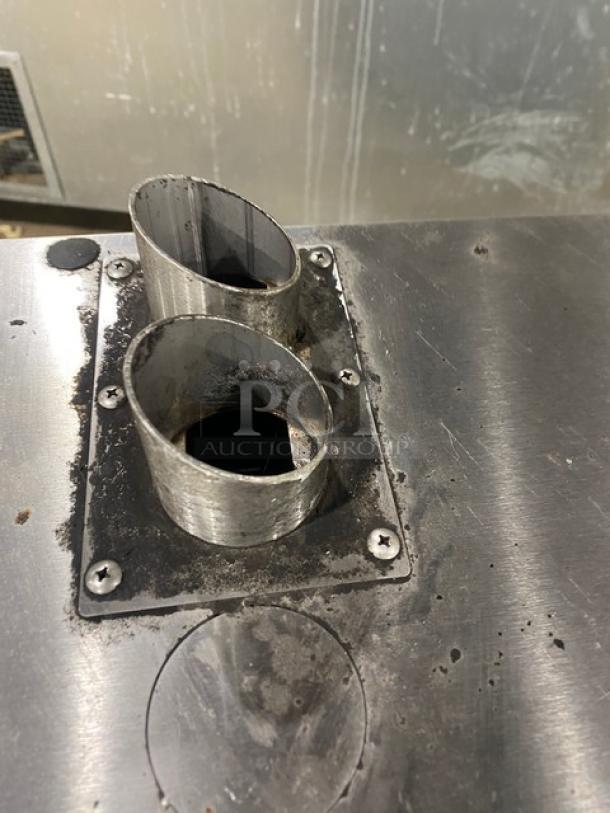 Alto-Shaam stainless steel countertop rotisserie oven, electric powered, featuring digital controls. Used condition.