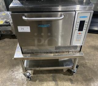 TurboChef stainless steel rapid cook oven, model NGC, with digital controls, on equipment cart. 208/240V, 1 phase. Serial: NGCD634112.
