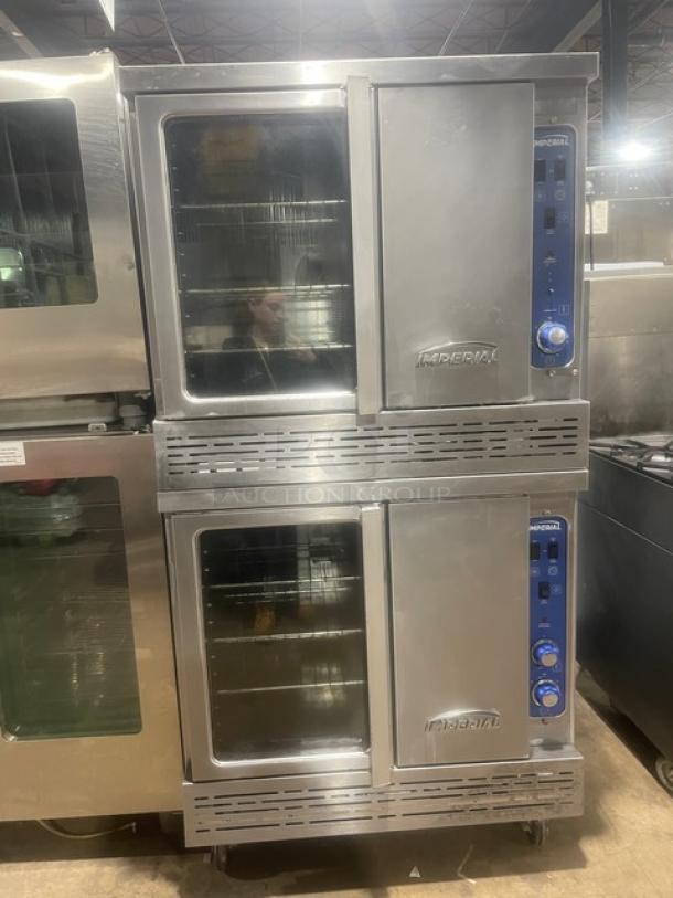 Imperial stainless steel double-stacked convection oven, natural gas powered, wired rack, on casters, excellent condition.
