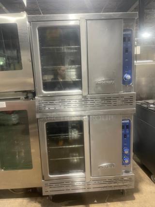 Imperial stainless steel double-stacked convection oven, natural gas powered, wired rack, on casters, excellent condition.