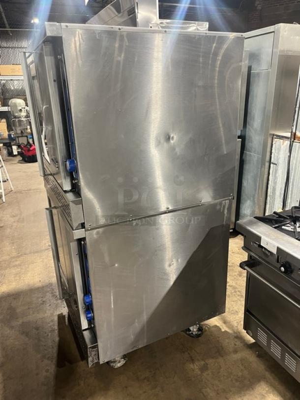 Imperial stainless steel double-stacked convection oven, natural gas powered, with wired oven rack, on casters, used condition.