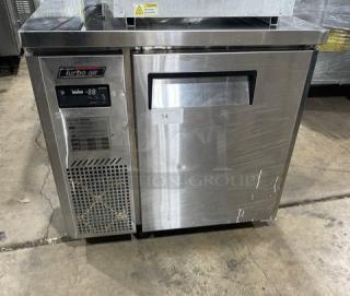 Turbo Air J Series stainless steel 1-door undercounter refrigerator, model JUR-36, on casters, with visible control panel and logo.