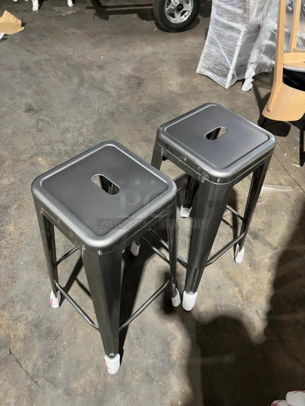Brand new gray gunmetal finished stackable bar-height stools, industrial style, backless, commercial-grade, set of 4.