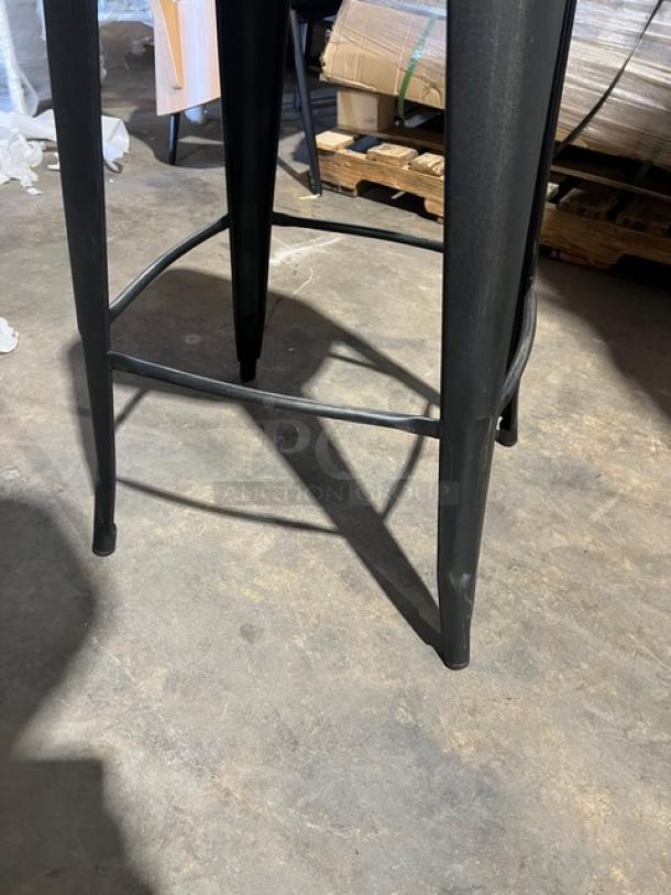 Black/Antique Gold distressed bar-height stool, backless, stackable. New condition, industrial style, commercial use.