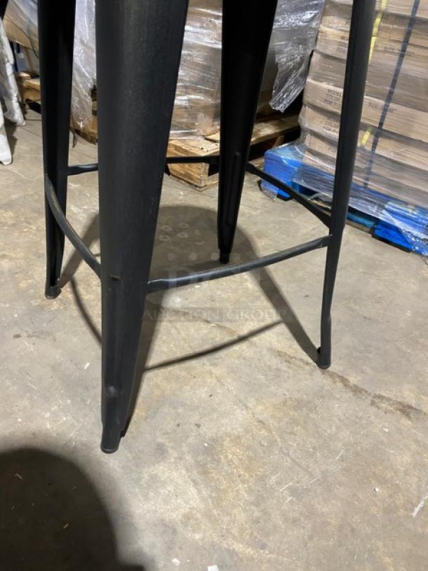 Brand new black/antique gold backless bar-height stool, stackable, distressed finish, industrial style, commercial use.