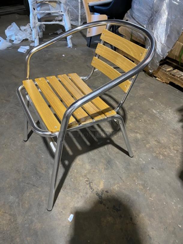 Brand new stackable aluminum dining/patio chair with faux teak slat back and seat. Indoor/outdoor use.