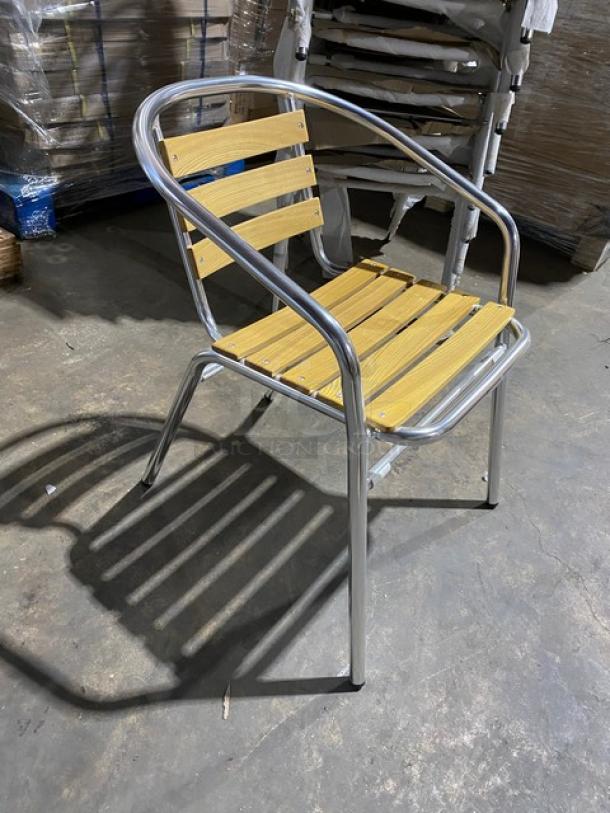 Brand new aluminum dining chair with faux teak slat back and seat, stackable, indoor/outdoor use.