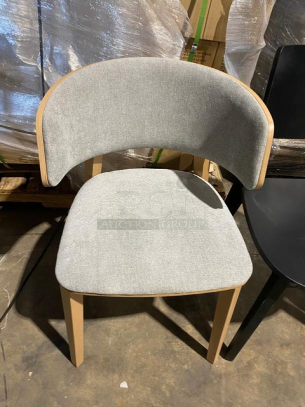 Brand new mid-century style dining chair, grey fabric seat, wooden frame, excellent condition, ideal for commercial use.