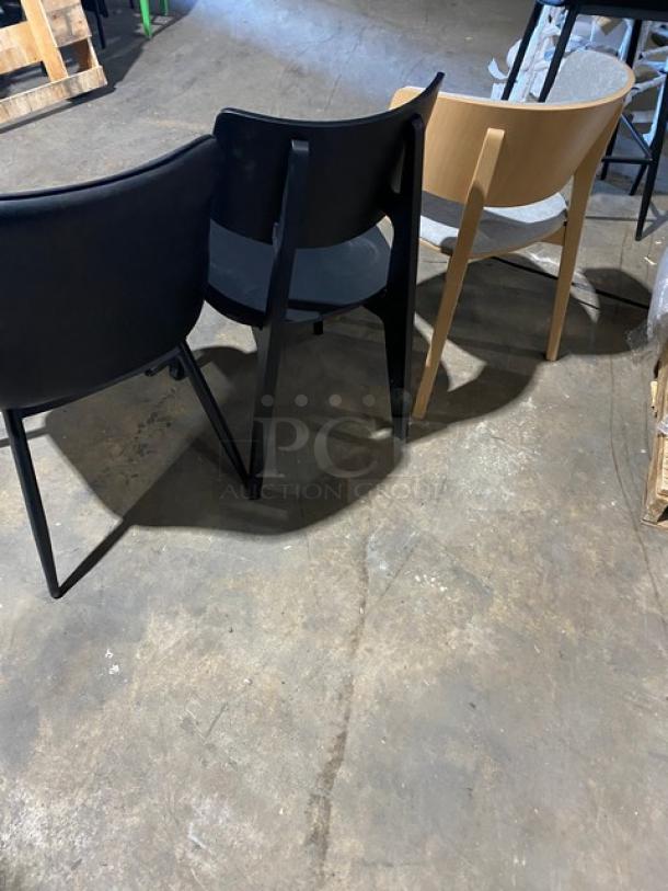 Three brand new mid-century style dining chairs, black and wood finish, commercial-grade, in excellent condition.