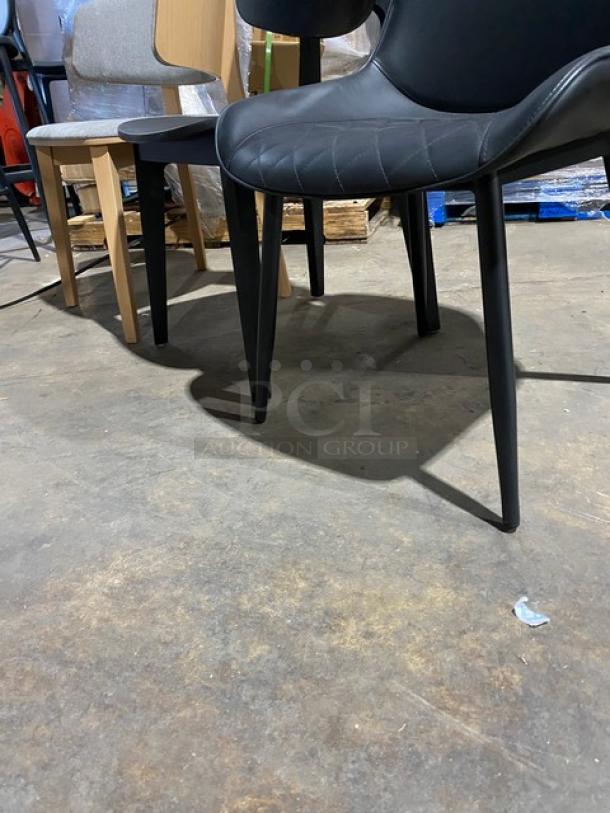 Brand new assorted mid-century style dining chairs, commercial-grade, featuring sleek black and wood finishes.