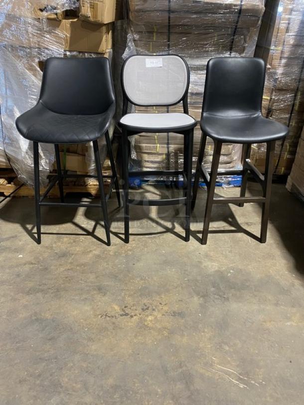 Three brand new modern bar-height dining chairs in assorted styles, featuring black and white upholstery, durable frames.