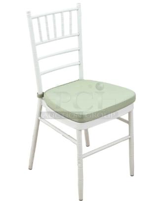 Brand new white resin Chiavari dining chair with sage green cushion, commercial grade, pristine condition.