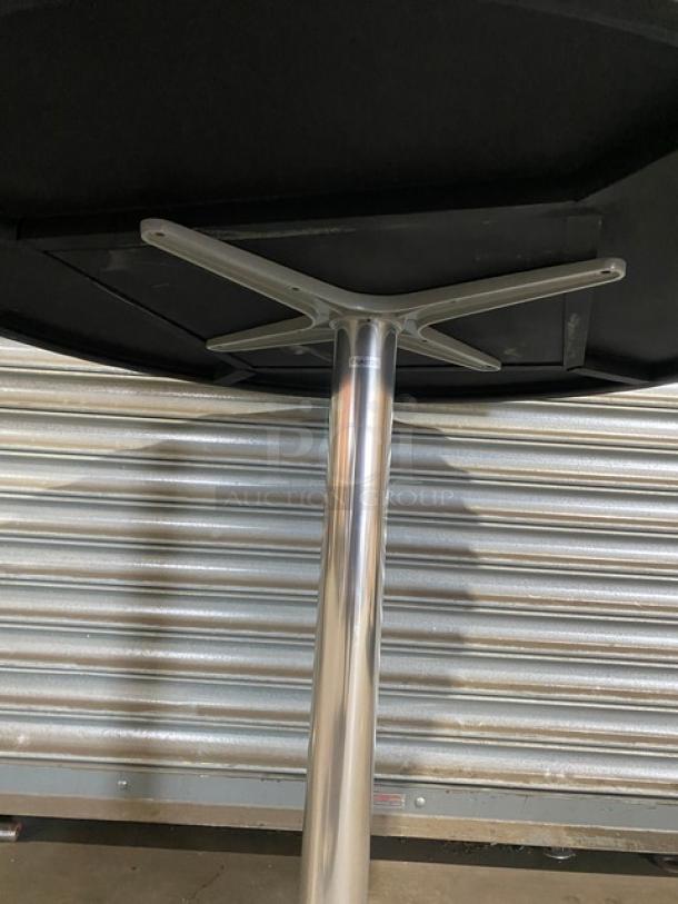 Brand new rustic wooden round dining table with 4-leg pedestal base; commercial-grade, durable construction.