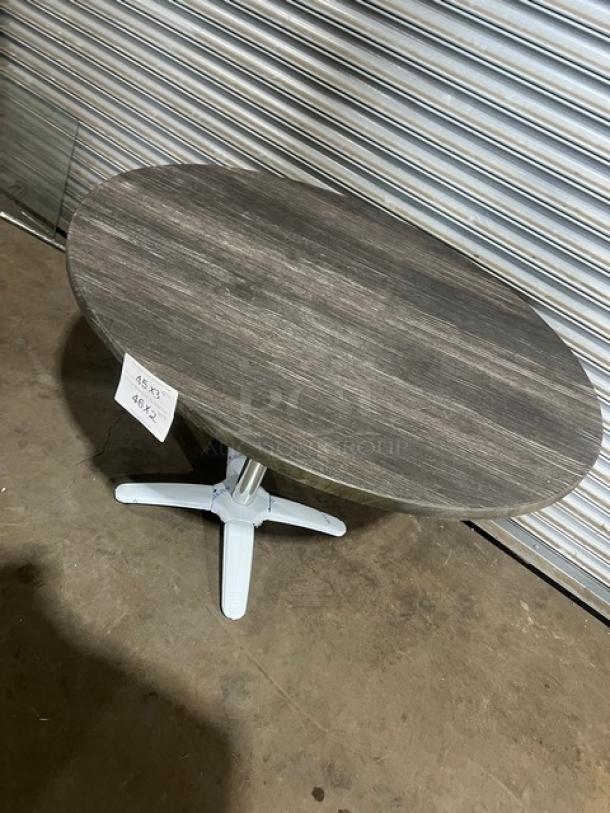 Brand new DuroWood 42" round dining table, model DW42, with 4-way pedestal base. Durable and modern design.