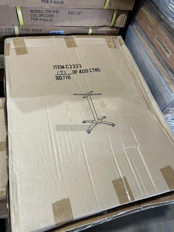 Brand new DuroWood 24" round dining table, model DW-R24, with 4-way pedestal base. Box labeled "Item: C2323, 12 of 400 CTNS."