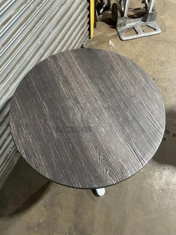 Brand new DuroWood 24" round dining table, model DW-R24, with a 4-way pedestal base. Durable wood finish.