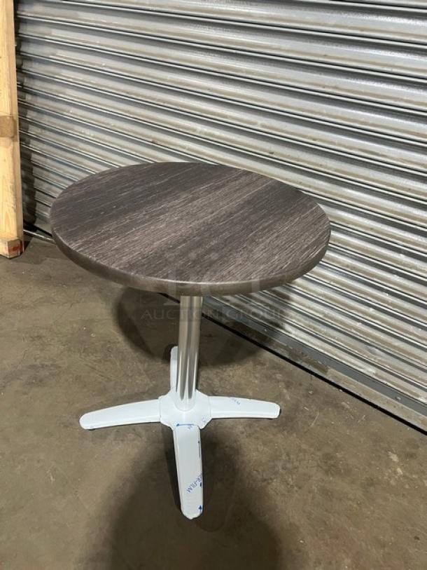 Brand new DuroWood 24" round dining table, model DW-R24, featuring a 4-way pedestal base. Durable and modern design.