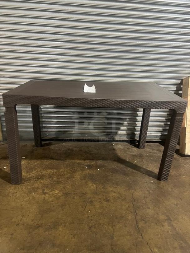 Brand new Rainbow Arizona 140"x80" rectangular outdoor table. Brown polypropylene, faux wood slats, rattan finish.
