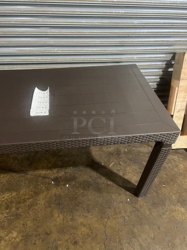 Brand new Rainbow 140"x80" rectangular outdoor table. Brown faux wood, polypropylene, rattan finish, slated top, on legs.