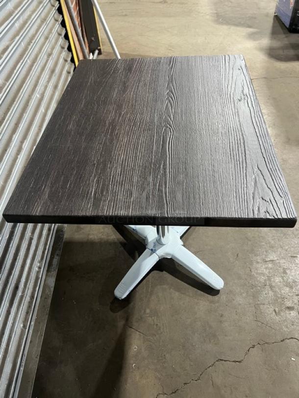 Brand new DuroWood 24"x30" rectangular dining table, model DW2430, with durable wood finish and 4-way pedestal base.