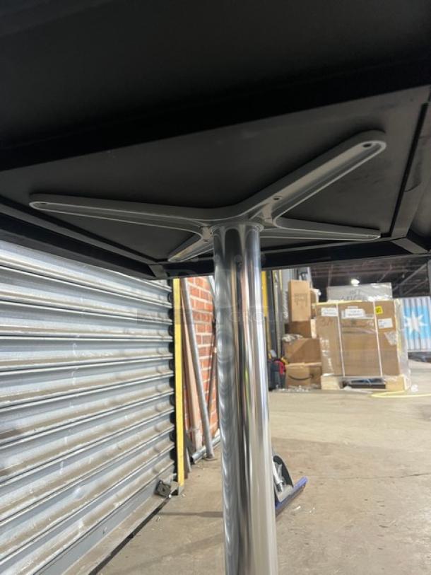 Brand new DuroWood 24"x30" dining table, model DW-2430, with a 4-way pedestal base, in excellent condition.