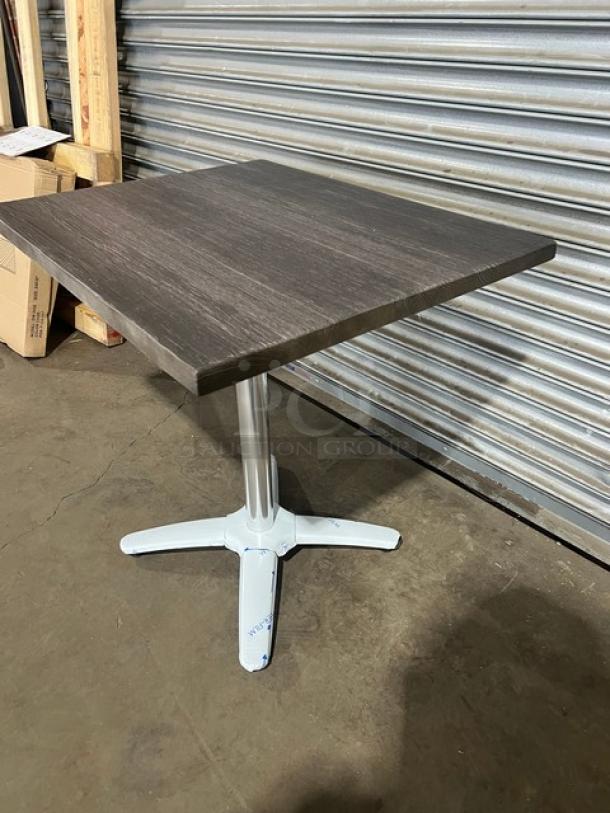 Brand new DuroWood DW2430 dining table, 24"x30", rectangular, dark finish, 4-way pedestal base, durable commercial use.