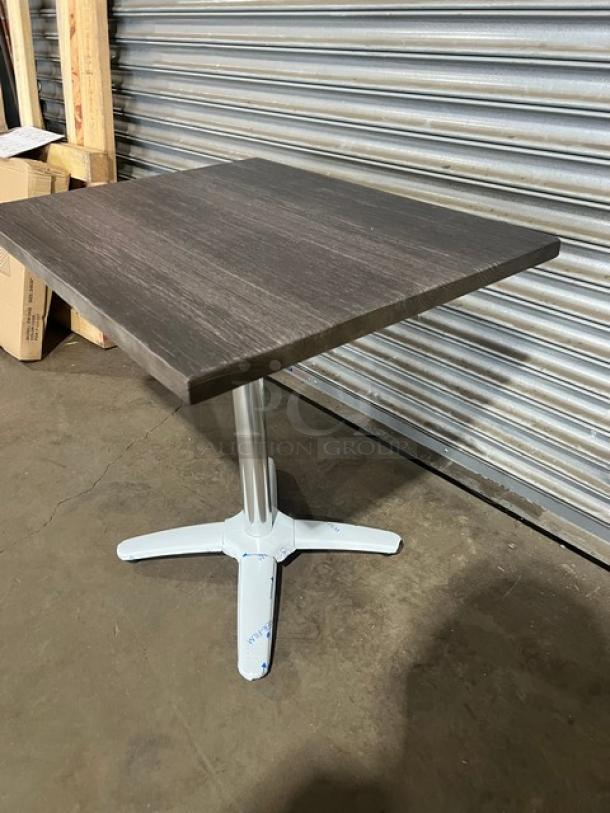 Brand new DuroWood DW2430 dining table, 24"x30", rectangular, dark wood top, 4-way pedestal base, commercial use.