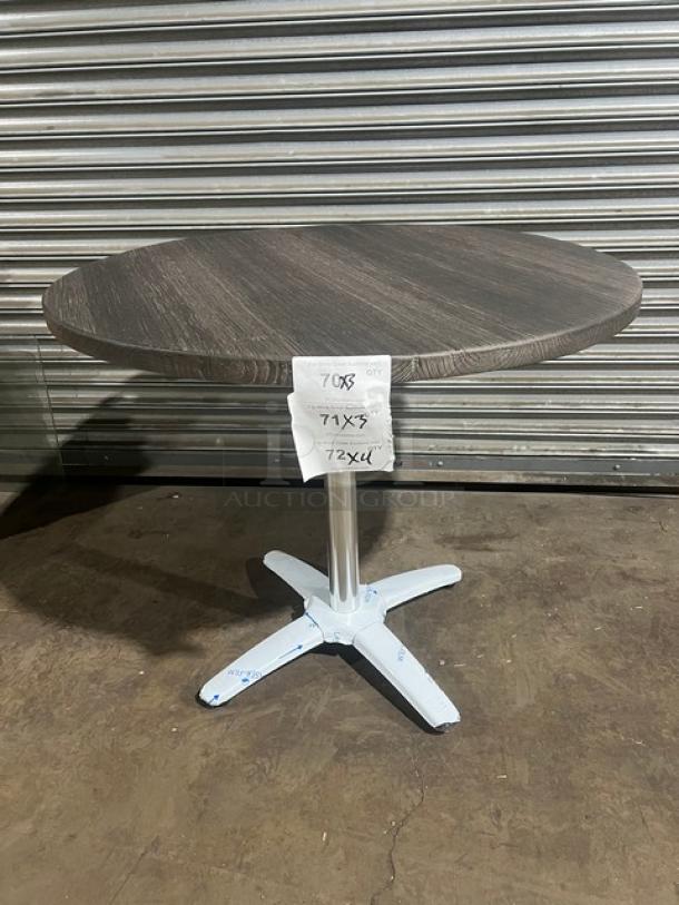 Brand new DuroWood 36" round dining table, model DW-36, with a 4-way pedestal base. Durable, commercial-grade.